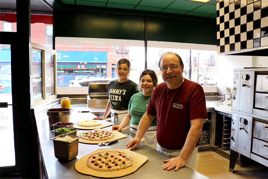 Sammy's Family preparing Pizza